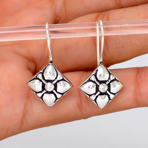 Beautiful Floral Engraved Oxidised Silver Earrings from Trenzify Store.