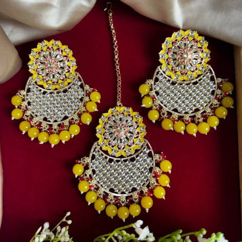 Yellow Beaded Kundan Earrings & Maang Tikka Set from Trenzify Store.