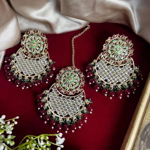 Maroon Beaded Kundan Earrings & Maang Tikka Set from Trenzify Store.