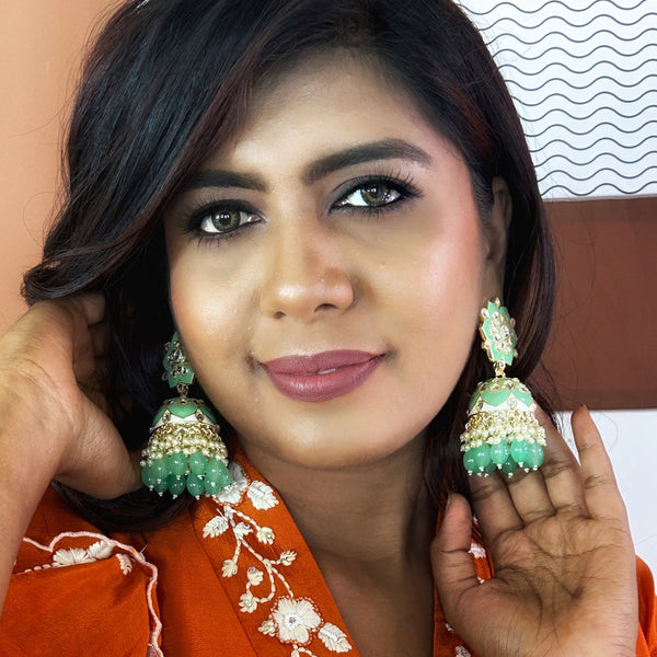 Floral Meenakari Kundan Jhumka Earrings from Trenzify Store.