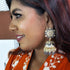 Floral Meenakari Kundan Jhumka Earrings from Trenzify Store.