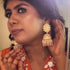 Floral Meenakari Kundan Jhumka Earrings from Trenzify Store.