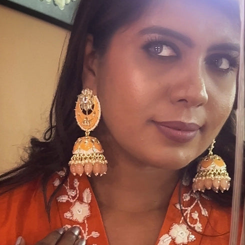 Meenakari Kundan Jhumka Earrings from Trenzify Store.