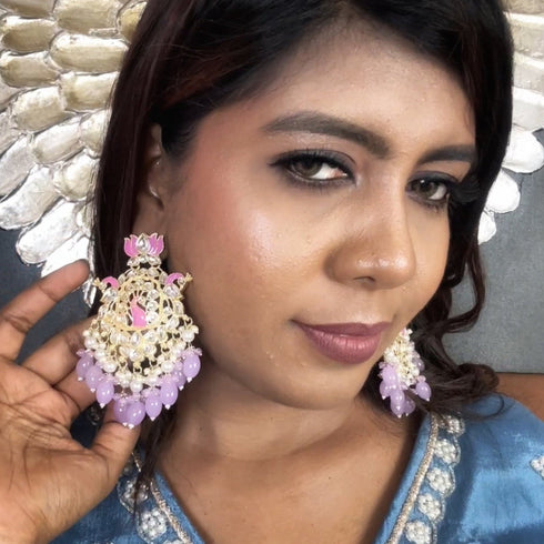 Lotus & Peacock Kundan Earrings from Trenzify Store.