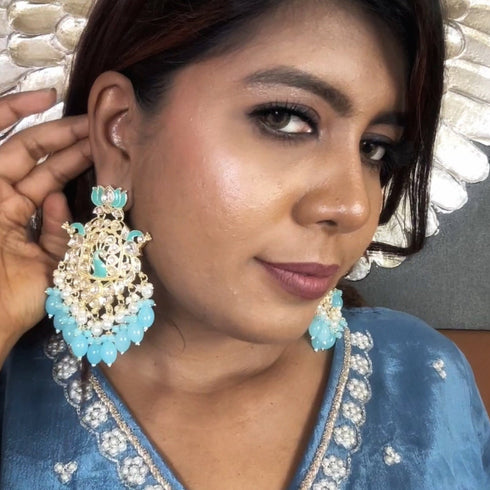Lotus & Peacock Kundan Earrings from Trenzify Store.