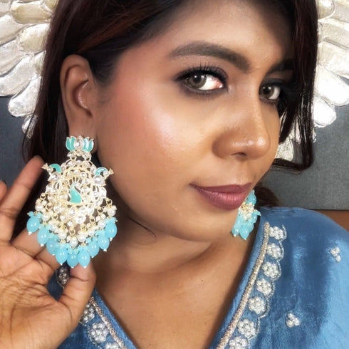 Lotus & Peacock Kundan Earrings from Trenzify Store.