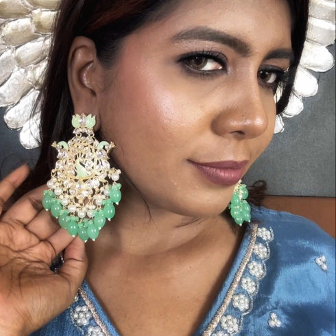 Lotus & Peacock Kundan Earrings from Trenzify Store.