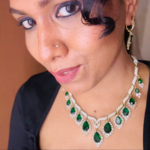 Model wearing American Diamond (CZ) green teardrop necklace set with matching earrings β imitation jewelry from Trenzify Store.