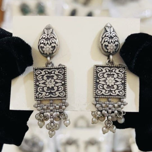 Handcrafted oxidized earrings with square floral design, lattice base, and pearl drop accents β traditional ethnic jewelry from Trenzify Store