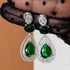 Model wearing American Diamond (CZ) green teardrop necklace set with matching earrings β imitation jewelry from Trenzify Store.