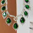 Model wearing American Diamond (CZ) green teardrop necklace set with matching earrings β imitation jewelry from Trenzify Store.