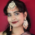 Peach Beaded Kundan Earrings & Maang Tikka Set from Trenzify Store.