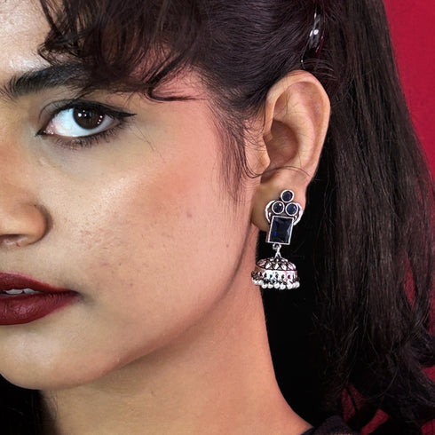 Traditional Silver Jhumka Earrings with Colored Stones & Pearl Drops from Trenzify Store.
