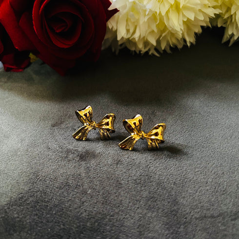 Golden Bow anti-tarnish stud earrings with high gold plating and polished finish from Trenzify Store