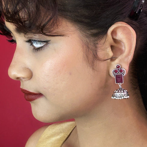 Traditional Silver Jhumka Earrings with Colored Stones & Pearl Drops from Trenzify Store.