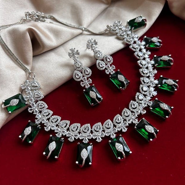 Model wearing American Diamond (CZ) green rectangular stone necklace set with matching earrings β imitation jewelry from Trenzify Store.