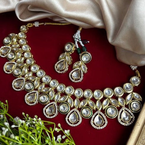 Majestic High Gold Kundan Necklace Set for Women from Trenzify Store.