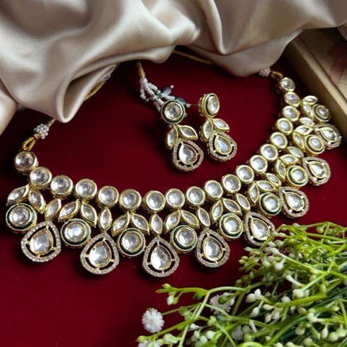 Majestic High Gold Kundan Necklace Set for Women from Trenzify Store.