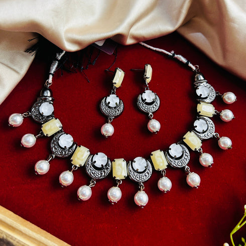 White Dual-Tone Beaded Oxidised Necklace Set from Trenzify Store.