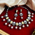 White Dual-Tone Beaded Oxidised Necklace Set from Trenzify Store.