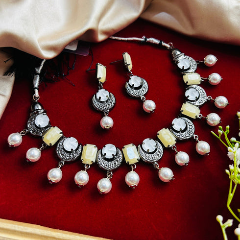White Dual-Tone Beaded Oxidised Necklace Set from Trenzify Store.