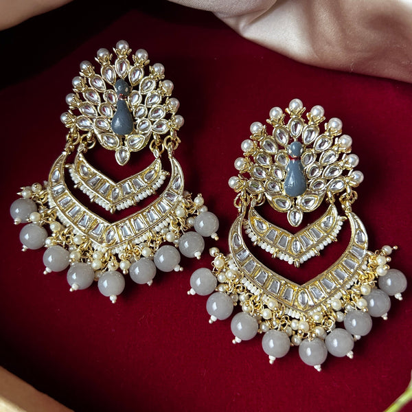 Kundan Peacock Chandbali Earrings from Trenzify Store.