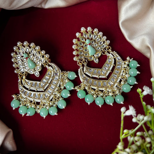 Kundan Peacock Chandbali Earrings from Trenzify Store.