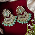 Kundan Peacock Chandbali Earrings from Trenzify Store.