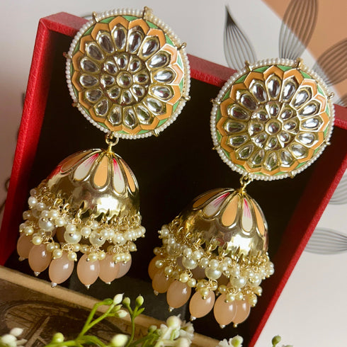 Regal Floral Meenakari Kundan Jhumka Earrings from Trenzify Store.