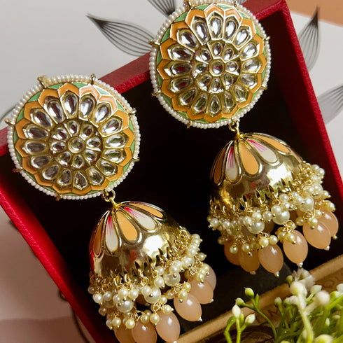 Regal Floral Meenakari Kundan Jhumka Earrings from Trenzify Store.