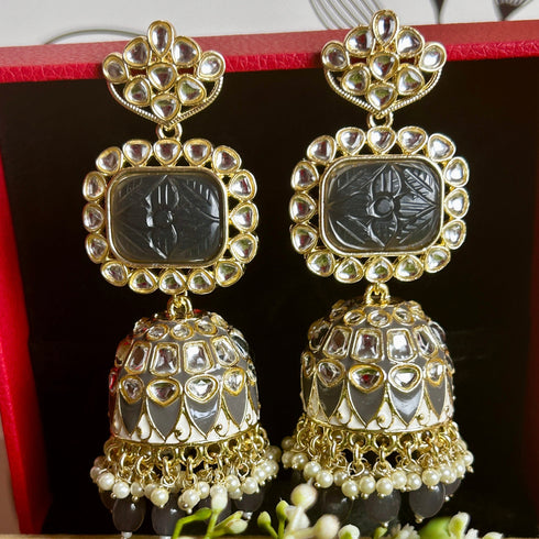 Carved Stone Kundan Jhumka Earrings from Trenzify Store.