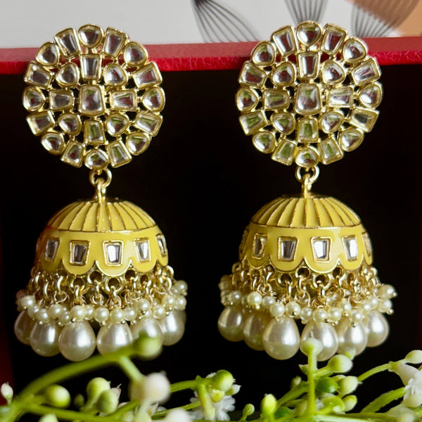 Floral Meenakari Kundan Jhumka Earrings from Trenzify Store.