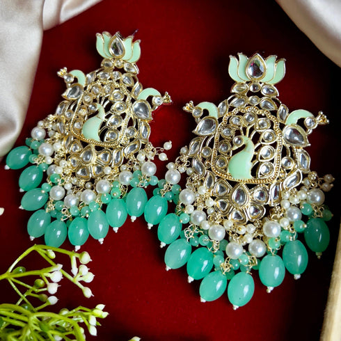 Lotus & Peacock Kundan Earrings from Trenzify Store.