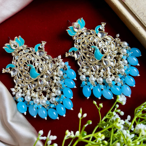 Lotus & Peacock Kundan Earrings from Trenzify Store.