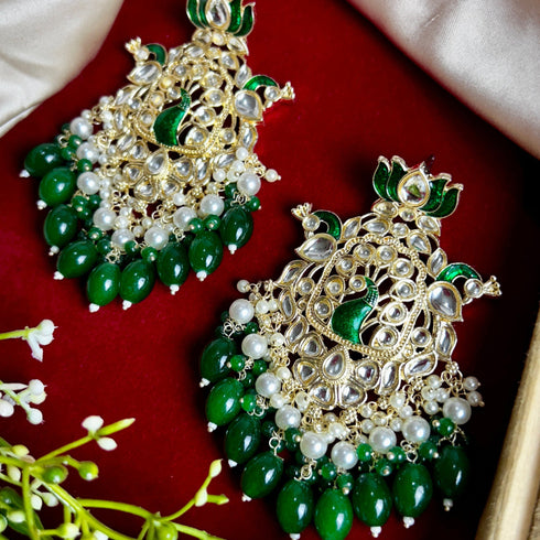 Lotus & Peacock Kundan Earrings from Trenzify Store.
