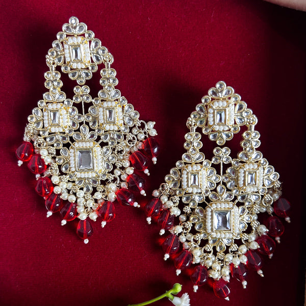 Red Beaded Kundan Chandelier Earrings from Trenzify Store.
