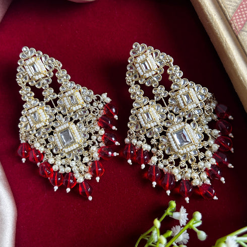 Red Beaded Kundan Chandelier Earrings from Trenzify Store.
