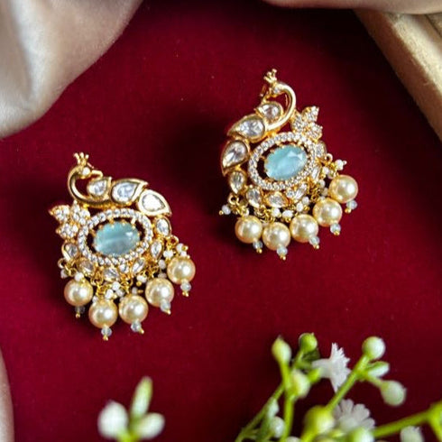 Party wear Kundan Earrings with Gold Plating from Trenzify Store.