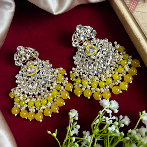 Yellow Beaded Kundan Chandbali Earrings from Trenzify Store.