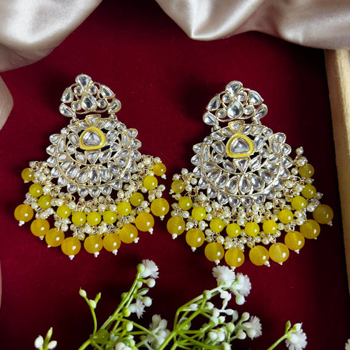 Yellow Beaded Kundan Chandbali Earrings from Trenzify Store.