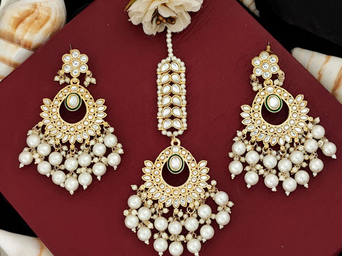 White Pearl Kundan Earrings & Maang Tikka Set from Trenzify Store.