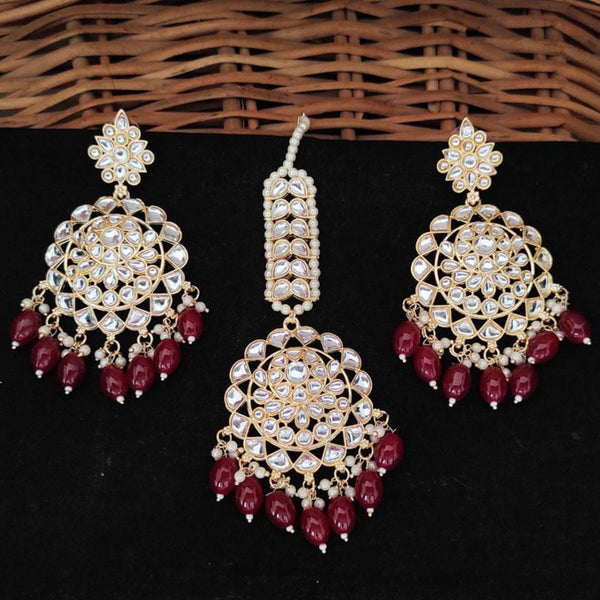 Maroon Beaded Kundan Earrings & Maang Tikka Set from Trenzify Store.