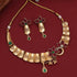 Gold choker necklace set with red stones, matching earrings and bracelet – imitation jewelry from Trenzify Store.